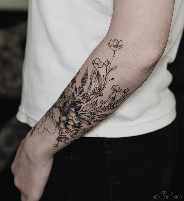 Beautiful floral black and grey tattoo                              …