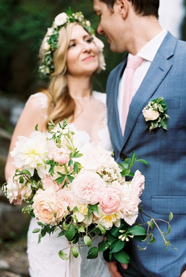 Spring adventure elopement at Wahclella Falls with pink, peach and white wedding...