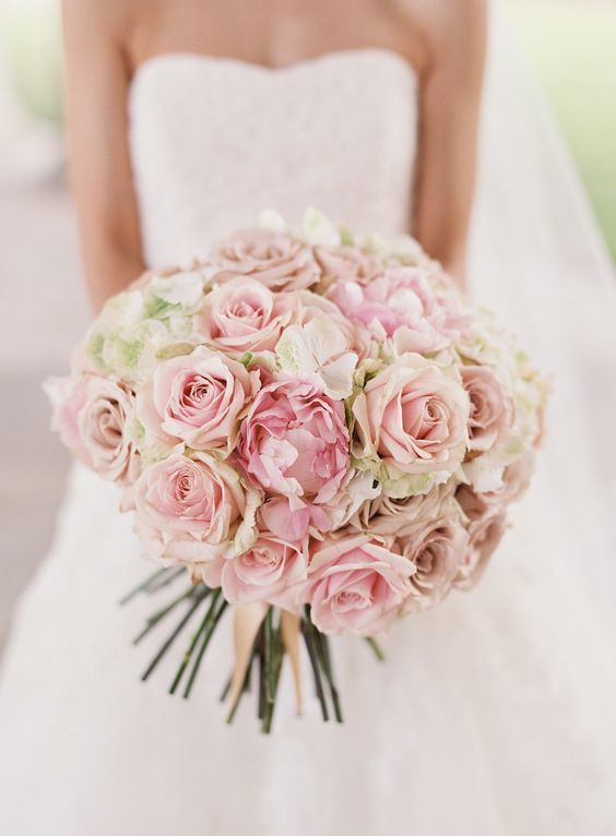 A classic round bouquet of blush roses: Photography : Natasha Hurley Photography...