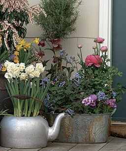 Flea market finds come to life as containers for pots of flowers